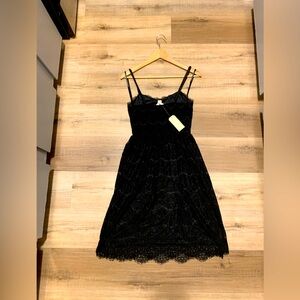 Monteau Los Angeles black lace baby doll style spaghetti strap dress.